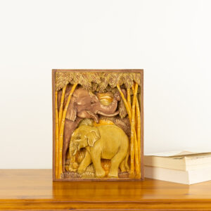 Intricate hand-carved wood wall relief of elephants in a forest by Sunflower Arts and Crafts for BISO.