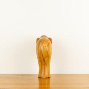 Modern minimalist hand-carved wooden elephant sculpture by traditional artists for BISO.
