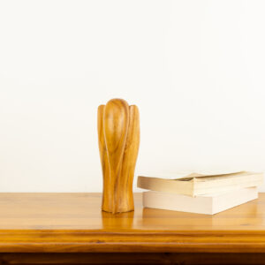 Modern minimalist hand-carved wooden elephant sculpture by traditional artists for BISO.