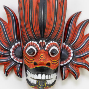 Authentic Gini Raksha Sri Lankan fire mask, hand-carved Kaduru wood with red and black flame wings, intricate hand-painted linework for BISO Heritage Collection.