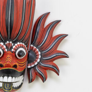 Authentic Gini Raksha Sri Lankan fire mask, hand-carved Kaduru wood with red and black flame wings, intricate hand-painted linework for BISO Heritage Collection.
