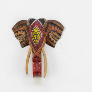 Front-facing 15cm hand-painted elephant wall sculpture, bronze and yellow sunflower ears, geometric forehead motif for BISO Heritage Collection.