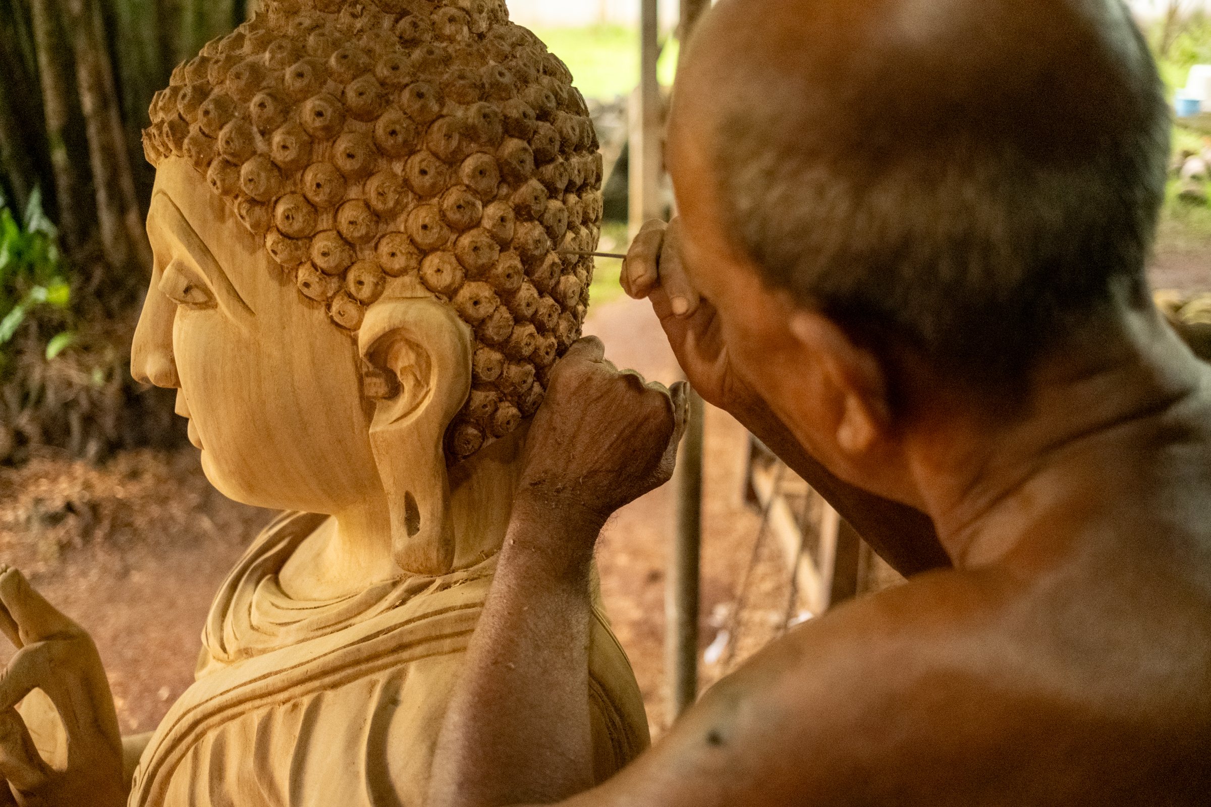 wood carving buddha statue