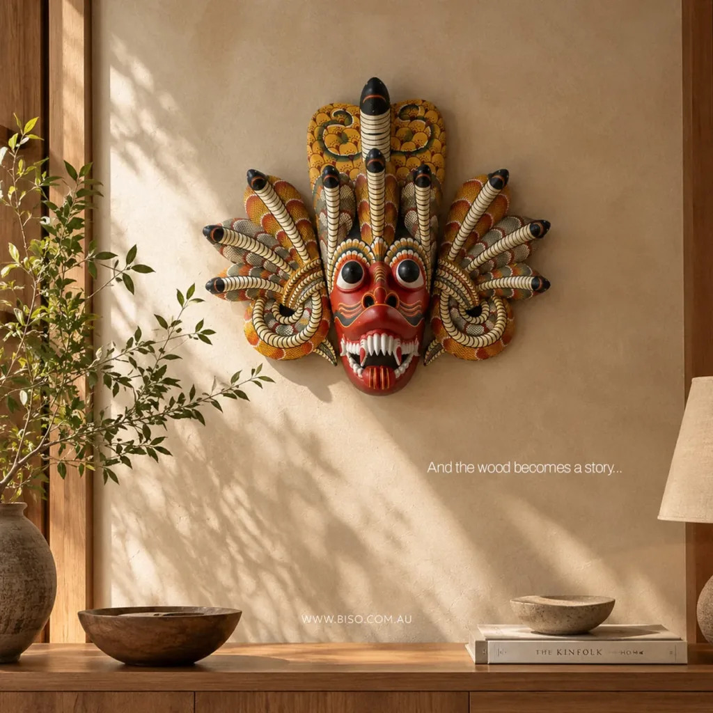Authentic handmade Sri Lankan mask – Naga Raksha displayed as wall decor in a warm, modern Australian home, a meaningful Christmas gift