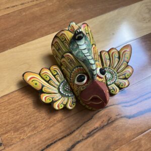 The Gurulu Gini Raksha is a traditional Sri Lankan handcrafted wooden mask