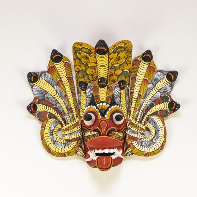 Authentic Naga Raksha Sri Lankan mask, hand-carved Kaduru wood with 7 cobra hoods, traditional red and yellow hand-painted details for BISO Heritage Collection.