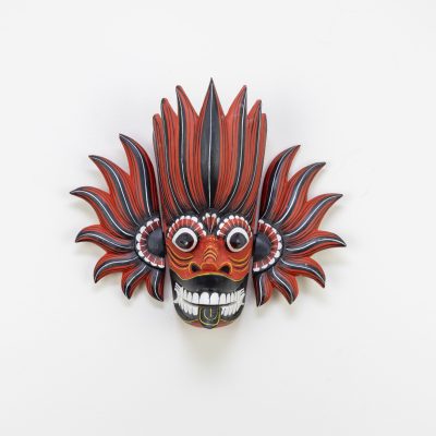 Authentic Gini Raksha Sri Lankan fire mask, hand-carved Kaduru wood with red and black flame wings, intricate hand-painted linework for BISO Heritage Collection.