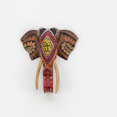 Front-facing 15cm hand-painted elephant wall sculpture, bronze and yellow sunflower ears, geometric forehead motif for BISO Heritage Collection.